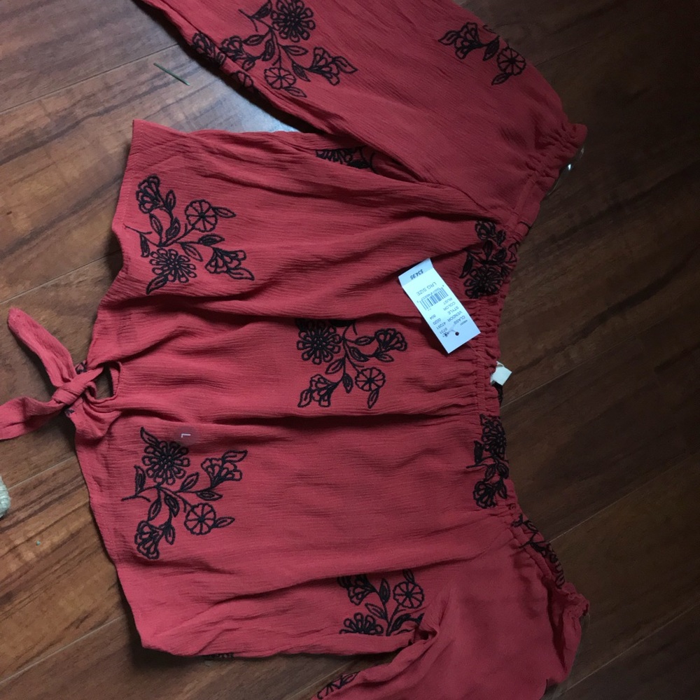 Super cute, brand new, red crop top.